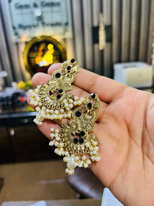 German Style Golden Earrings With Black Beads
